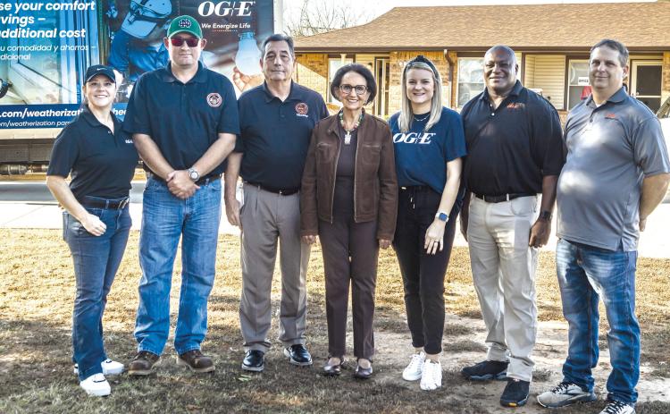 Citizen Potawatomi Nation Vice Chair Linda Capps (center) poses with OG&amp;E staff as the weatherization of the tribe’s Father Joe Murphy Elder Housing community in Shawnee began. Photo provided