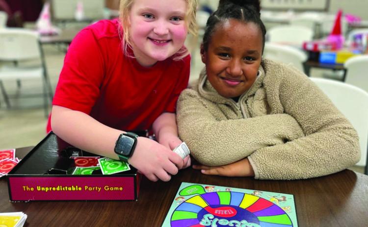 Teens gather for a board game night at the Tecumseh Public Library. Photo provided by PLS