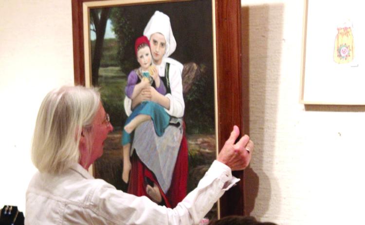 Lisa Vernon selects a Bouguereau study of "Breton Brother and Sister" painted by Charles Spillers of Tecumseh during the Mabee-Gerrer Museum of Art "Off the Wall" event on April 25. Spillers donated three Bouguereau study paintings and two pencil drawings of an elephant and a hawk. According to Director Dane Pollei, 60 artists donated 129 works of art to the 16th annual fundraiser. Natasha Dunagan, Countywide & Sun
