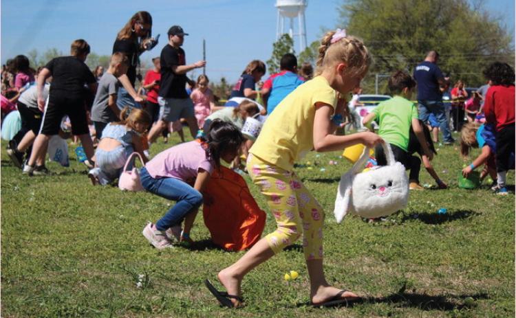 Children in the 7-8 age group pick up plastic eggs during the Tecumseh EGGsperience and Block Party on April 8. The event was organized by volunteers at Tecumseh First Assembly of God and held in the empty lot at South 4th and East Washington streets. Pastor Don Jonker said they were prepared with 7,000 filled plastic eggs, and estimates they hosted between 300 and 350 children. See additional photos on page A7. Countywide &amp; Sun/Natasha Dunagan