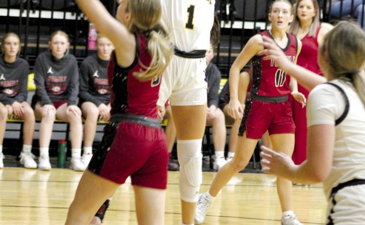 Tecumseh senior Serenity Jacoway makes a bucket in the second quarter of the first home game against Tuttle, Nov. 28. The Lady Savages lost, 26-46. Countywide &amp; Sun/Natasha Dunagan