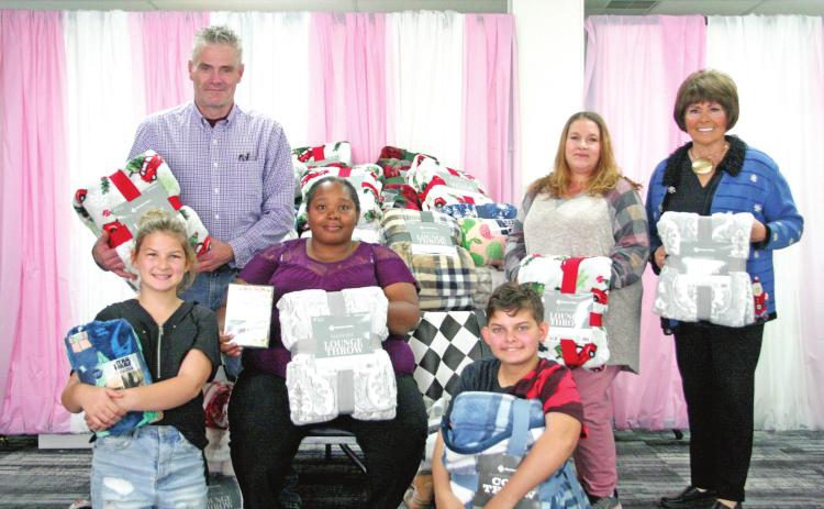 Volunteers Prepare A Trunkmas Party For Foster Children