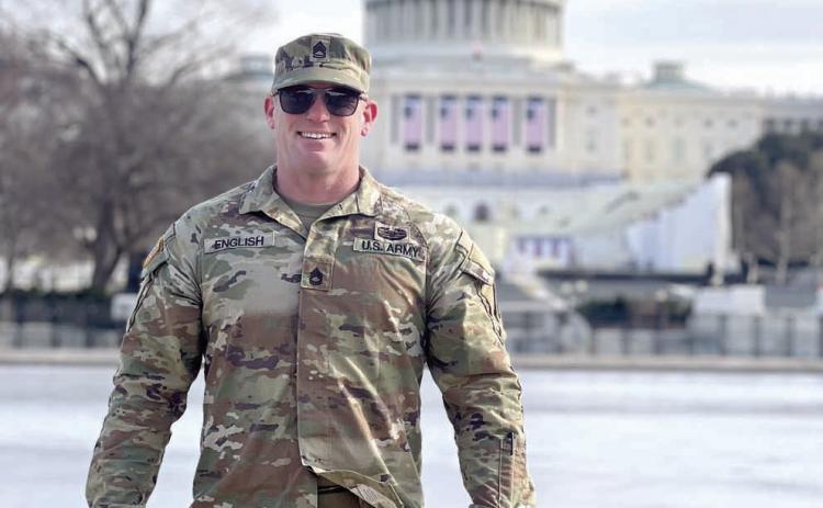 Army National Guardsman Joseph English poses in front of the United States Capitol building earlier this month. English was in Washington, DC to help with the Presidential Inauguration. Photo provided by Shawna English.