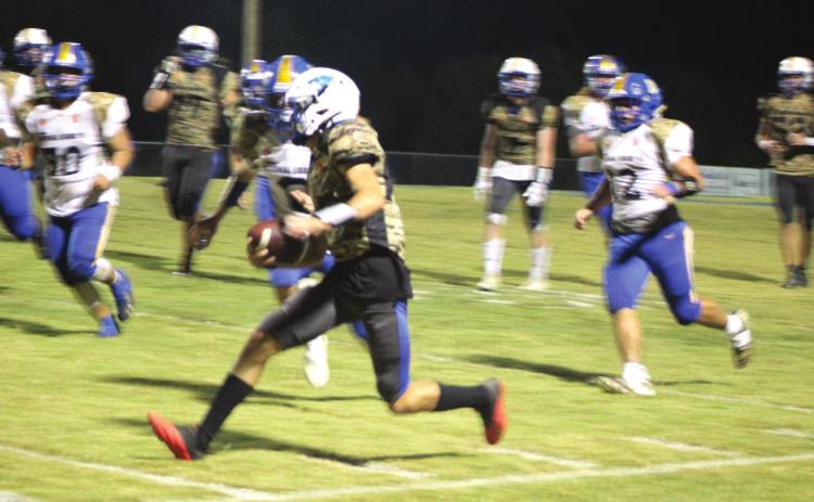 Bethel freshman Bryce Tapley runs down the sideline during the district home game against Holdenville on Military Night, Oct. 14. Bethel won 67-13. Countywide &amp; Sun/Natasha Dunagan