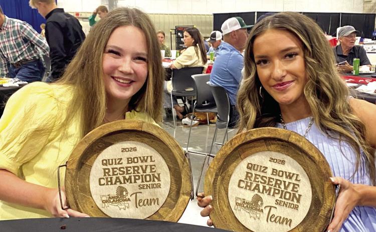 Taycie Baker and Madalyn Taron, both of Bethel, show their prizes for winning Quiz Bowl Reserve Champion Senior Team during The Fuzion by NAJRAE in Woodward last month. Photo provided
