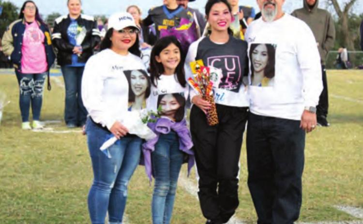 Bethel Cheerleader Arianna Avitia poses with her family during Senior Night on Oct. 28. Bethel honored 24 seniors in football, band, cheerleading, and cross country that evening. Countywide &amp; Sun/Natasha Dunagan
