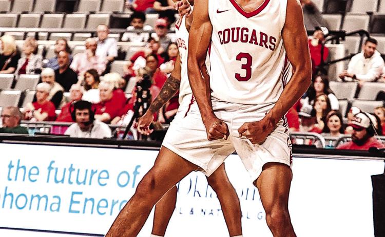 Tyson Hawkins gets pumped after making a basket before halftime, but NRC came up short against Fort Gibson in the quarterfinals of the state tournament, losing 47- 44. A weather delay due to a tornado warning interrupted the game in the final quarter (similar to their experience from last year). Photos Courtesy of Gowin Photography