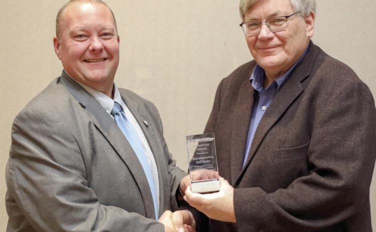 OKFB President Rodd Moesel (right) presents Rep. Dell Kerbs with an Oklahoma Farm Bureau Champion award at the 2024 OKFB Leadership Conference Feb. 13. Photo provided