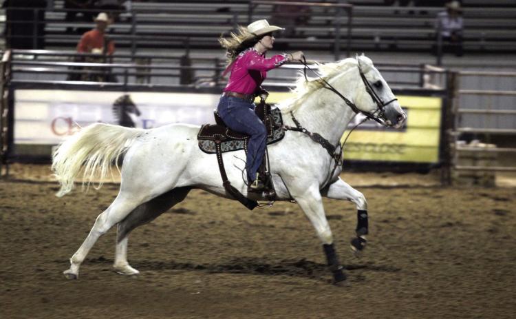 Megyn Alls of Shawnee sprints from one barrel to the next during the International Finals Youth Rodeo opening night on July 6, 2025. File Photo