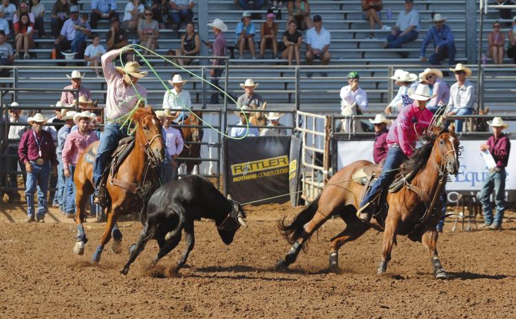 Stephen Wickerd of Shawnee and Cade Ferguson of Cloncurry, Queensland, Australia, team up for the International Finals Youth Rodeo on the morning of July 10 at the Heart of Oklahoma Expo Center.