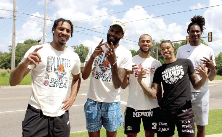 Members of the Potawatomi Fire team pose in front of Epic Snocones at the corner of Beard and Dunbar during the Juneteenth celebration on June 19. Shown, from left, are K.T. Boucham, Jachai Simmons, Jaylen Mahone, Chuck Guy, and Jay Hedgeman. Natasha Dunagan, Countywide & Sun