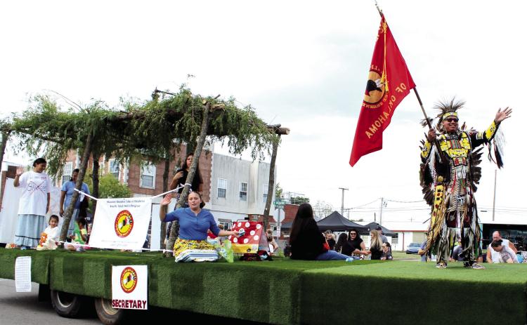 Members of the Absentee Shawnee Tribe ride on their float in the 50th Anniversary Frontier Days Parade on Sept. 26.