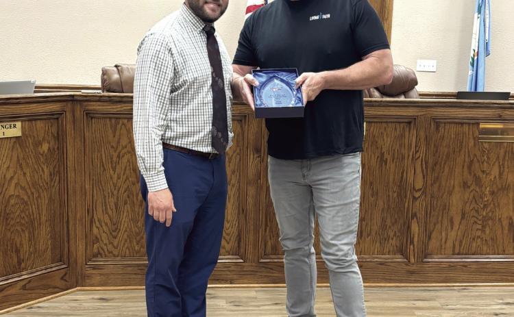 McLoud Mayor Daniel McClure (right), poses with Citizen of the Year recipient, Doug Walker. Walker was recognized for his volunteerism and enthusiasm for community projects. Cheyanna Dietz, THS Intern