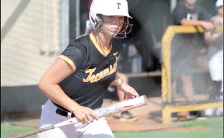 Tecumseh’s Katelyn Fleming puts her bat down after getting the walk during the home game against Blanchard on Aug. 8. Countywide &amp; Sun/Natasha Dunagan