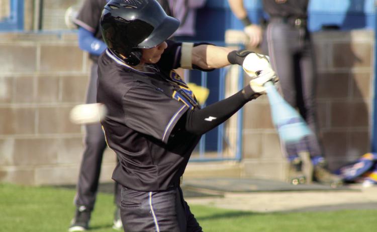 Bethel's Carson Kurkendell has a narrow miss during the second inning of the March 13 home game against Harrah. Photos by Natasha Dunagan, Countywide & Sun