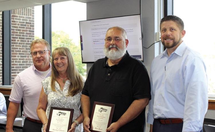 Two Shawnee Public Schools employees received awards from the Oklahoma Association of Pupil Transportation at a recent conference. They were recognized at the June 24 Shawnee Board of Education meeting. Sherry Gibson was named the OAPT Support Employee of the Year, and Ron Reser is the OAPT Bus Driver of the Year. Also shown are SPS Director of Operations Ron Stearns, far left, and Superintendent Dr. Aaron Espolt. Countywide & Sun/Natasha Dunagan