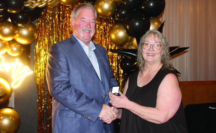 Countywide & Sun Owner and Publisher Suzie Campbell, right, presents Randy Gilbert with his Pottawatomie Power Poll Top 10 lapel pin during the Awards Gala on Oct. 24. Gilbert placed ninth in the five-year event. Natasha Dunagan, Countywide & Sun