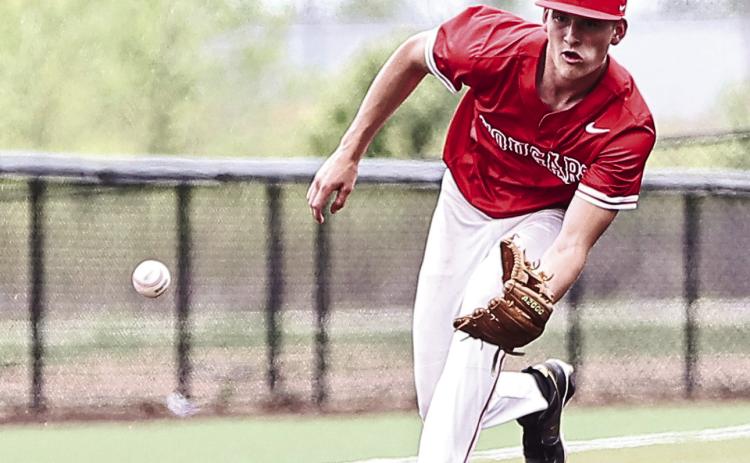 NRC's Landon Rosser gets the ball and throws to second base for the out on April 10.