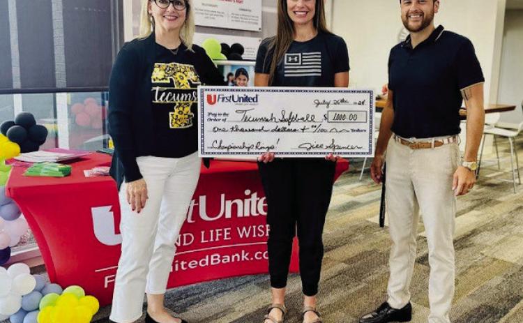 First United Bank donates $1,000 to the Tecumseh Lady Savages to assist in the funds being raised for the purchase of the 2024 State Championship rings. Pictured from left, FUB Tecumseh President Jill Spencer, Tecumseh Athletic Director Casi Bays, and Tecumseh Public Schools Director of Community Engagement Justin Wood. Photo provided by FUB