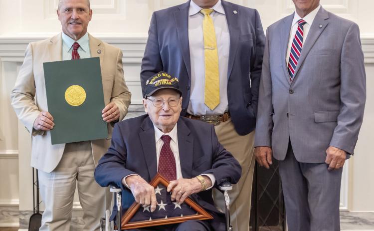 Pictured from left: Rep. Danny Sterling, World War II veteran Raymond Talley, Rep. Ty Burns, and Rep. John Talley. Photo provided