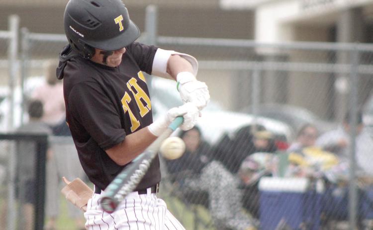 Tecumseh sophomore Wyatt Dodgion makes contact with the ball in the April 14 home game against Seminole. The Savages won, 8-0. Natasha Dunagan, Countywide & Sun