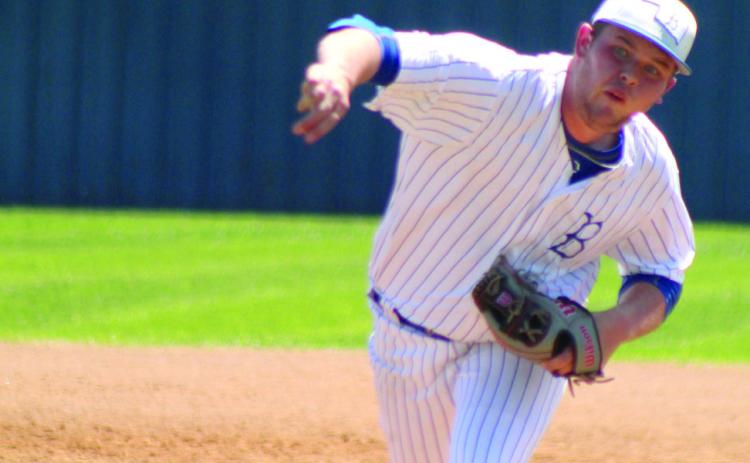 Bethel’s A.J. Carpenter slings the ball past home plate in the home game with Prague on April 14. The Wildcats won, 9-1. Countywide &amp; Sun/Natasha Dunagan