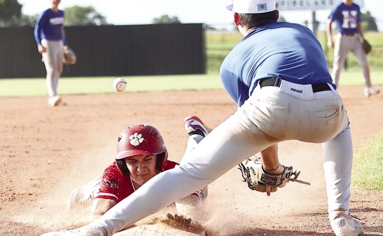 North Rock Creek's Hasten Conley beats the throw to third. Photos courtesy of Gowin Photography