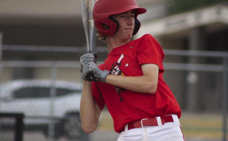 Junior Chase Harris, on the Dale Pirates team, dodges a ball while at bat in an American Legion Baseball summer game with Tecumseh during the John (Rocky) Barrett Classic at Tecumseh High School on June 20. The senior games were held at Shawnee High School. A total of 10 teams played in the round-robin tournament, which was won by Elk City for both seniors and juniors, said American Legion Baseball Assistant Director Keith Upton. (See full cutline below.)
