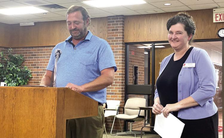 Will Merrick, Development Officer, with Pioneer Library System Foundation speaks with the Tecumseh City Council alongside Beth Lyle, Tecumseh Library Branch Manager, about applying for a TSET Legacy Grant. Julie Talton, Countywide & Sun