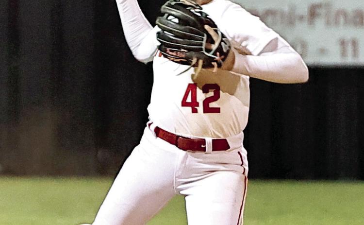 Noth Rock Creek's Sarah Campbell throws to first for the out. Photo courtesy of Gowin Photography