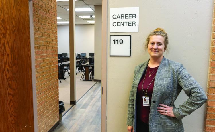 Research Librarian Ashley Bagwell stands beside the recently opened Career Center located in the David L. Boren Library on Seminole State College’s campus. Photo provided by SSC