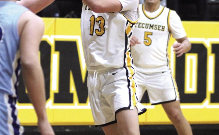 Tecumseh’s Creed Wright tries for a jump shot in the third quarter of the Dec. 19 home game with Bridge Creek. The Savages lost this close game, 60-63, but the Lady Savages won, 40-20, earlier that evening. Countywide & Sun/Natasha Dunagan