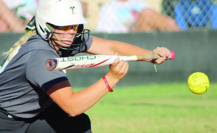 Tecumseh freshman Embrie Smith makes a sacrifice bunt during the Class 4A Fastpitch Softball Super Regionals on Oct. 5. This was in the second of three games with Blanchard over two days. The Lady Savages won the first game, 11-4; lost the second game, 2-4; and lost the third game in overtime, 6-8. They finish the season with a record of 32-6. Countywide & Sun/Natasha Dunagan