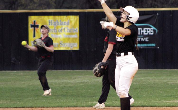 Tecumseh senior Taylor Gage claps and motions to her team after making a double during the Lady Savages' second home game of the evening, April 4. They won that game against Westmoore, 15-5, and with Latta, 6-4. Countywide & Sun/Natasha Dunagan