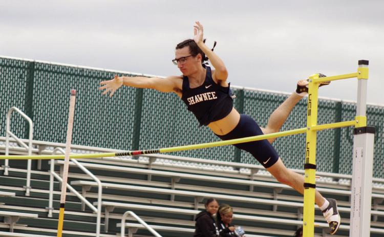 Shawnee’s Traydn Rakestraw lets go of the pole as he competes in the pole vault during the track and field meet held at OBU on April 9. Countywide & Sun/Natasha Dunagan