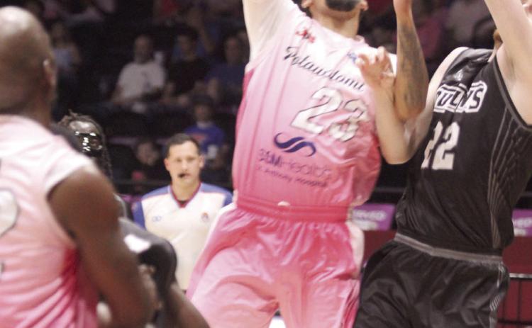 Potawatomi Fire forward Isaiah Wade goes up for a bucket during the April 9 Pink Out home game against the Enid Outlaws. Wade led the team in points that night with 32, plus nine rebounds. The Fire won their 59th game at FireLake Arena with a score of 125-104.