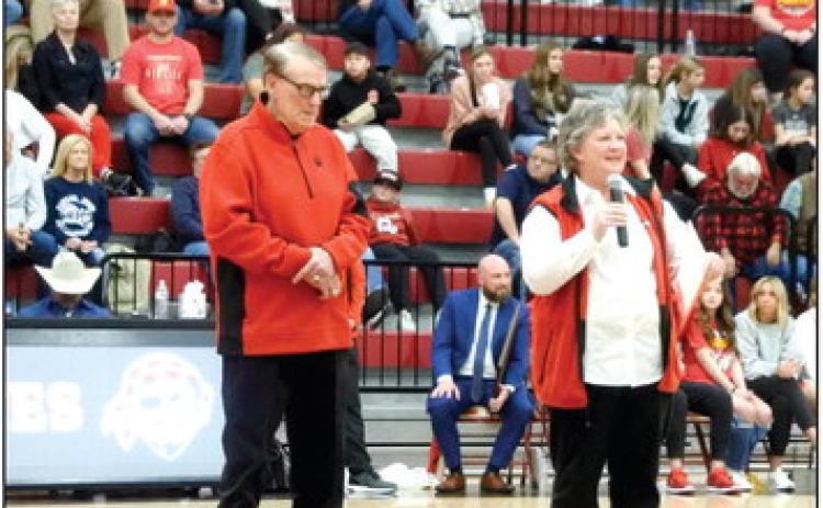 Carol Carter (right) shares memories of Coach Harold Jones winning seasons as he is honore for the 40th anniversary of the 1983 National Coach of the Year Award. Countywide &amp; Sun/Suzie Campbell