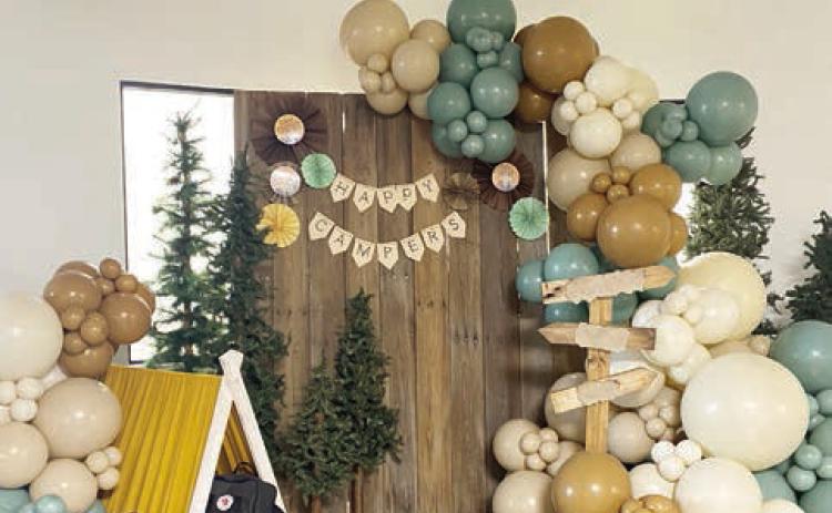 The entryway at Tecumseh Early Childhood Center has been transformed into a camper’s dream. This set up is sure to make first day of school photos extra adorable.