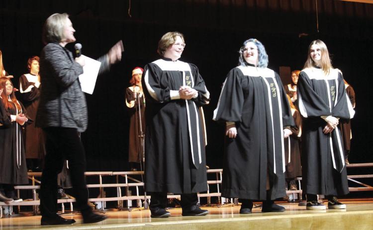 Tecumseh Public Schools Choir Director Cheryl Blankenship announces the All-State Choir students during the Tecumseh Vocal Music Winter Concert on Dec. 6. They are Jax Johnson, for the OCDA Junior High Mixed Chorus; Megan Quirk, for the OKMEA High School Mixed Chorus; and Zoey Edwards, for the OKMEA High School Treble Chorus. There were hundreds of choir students across the state who auditioned for these choruses. Countywide &amp; Sun/Natasha Dunagan