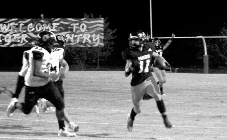 Maud senior Braxton McDaniel gains yardage during the home game against Graham- Dustin on Sept. 30. Maud won, 62-0, when the game was called after two quarters. Countywide &amp; Sun/Natasha Dunagan
