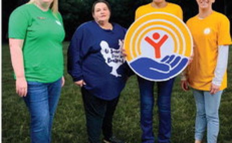 Sandy Vanderburg, Executive Director of United Way of Eastern Frontier Country, celebrates the new partnership with women from Worrel’s Haven. The collaboration will expand recovery support and resources for women in our community. Photo Provided
