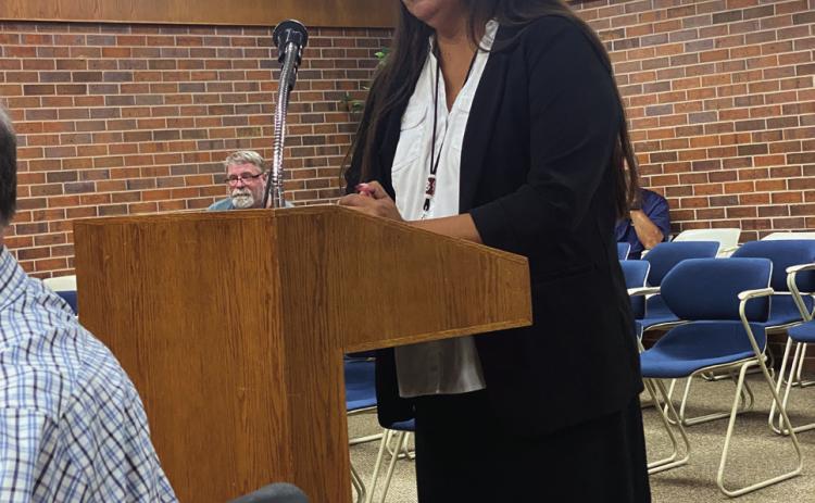 Briana Ponkilla, with the Absentee Shawnee Tribe, speaks to the council regarding the property formerly known as the Tecumseh Square being transitioned to being an office building for her 477 Program. Countywide &amp; Sun/Julie Talton