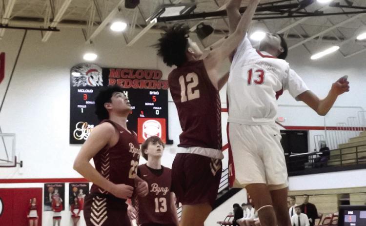 McLoud junior LaDamien Williams adds two points to the board during the Class 4A Distict home game against Byng on Feb. 22. The Redskins lost that game, 47-51, but will play in the consolation bracket of regionals in McLoud at 2:30 today (Feb. 27). Countywide & Sun/Suzie Campbell