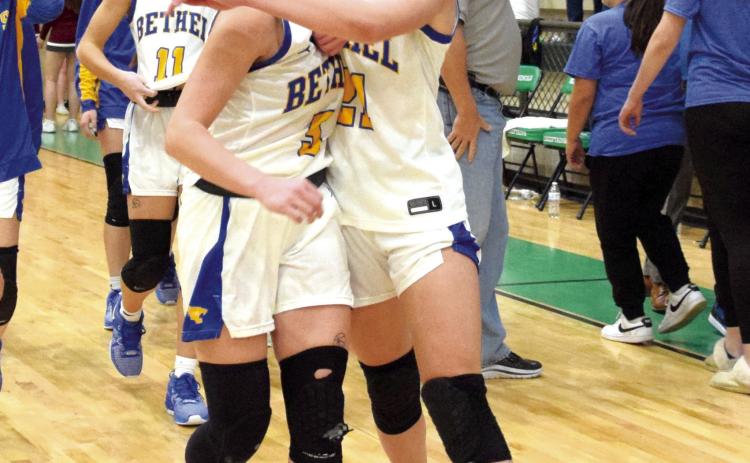 Bethel Junior Josie Megehee celebrates with Senior Brooklyn Duff as they walk off with a win in the Area Championship last Saturday. Countywide & Sun/Julie Talton