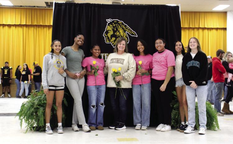 Cross Country Coach Kortney Ozment, center, poses with her cross country girls team during Tecumseh’s Fall Senior Night on Nov. 8. Shown, from left, are Anniah Phillips, JaNya Bruner, Marissa Johnson, Ozment, Aaliyah Stargell, Divyon Stargell, Katelyn Tonubee and Chandler Bryant. Photo provided by Tracey Forrester.