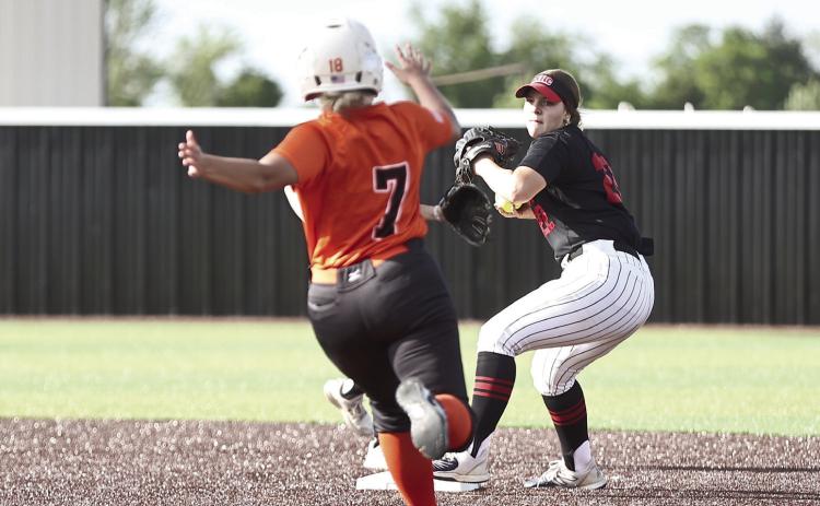 Morgan Bertram makes the out at second against Lexington in the double-header on April 13, hosted by NRC. NRC won both games, 15-0 and 19-5. Photo Courtesy of Gowin Photography