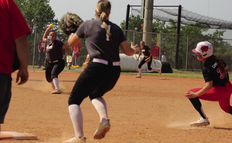 Tecumseh pitcher Khylei Daniels throws to first-baseman Samantha Schweighardt to get the third out in the bottom of the seventh inning and win the Class 5A State Semifinals against North Rock Creek on April 30. Last year, Tecumseh also played NRC during the semifinals and lost, 13-18. This year, they won, 13-7.