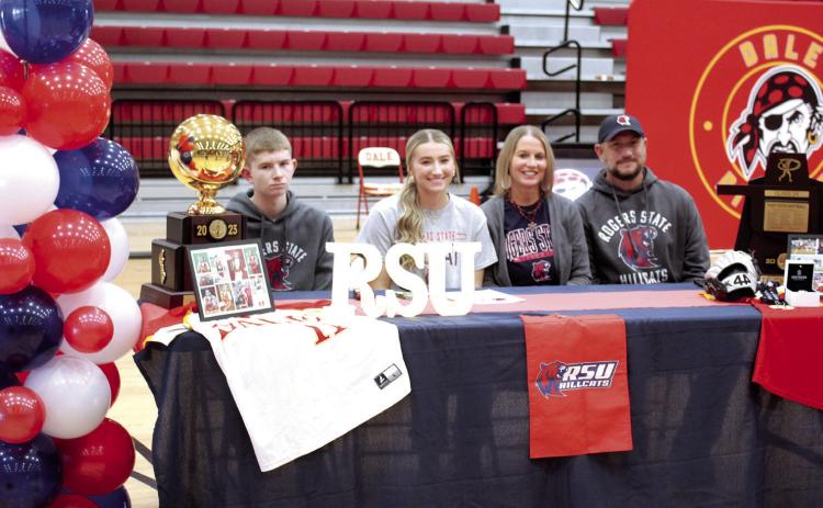 Kinsley Hill poses with her family after signing a letter of intent with Rogers State University in Claremore for softball during Dale Signing Day on Nov. 14. Also shown, from left, are brother, Carson Hill; mom, Cindy Hill; and, dad, Kirk Hill. Countywide & Sun/Natasha Dunagan