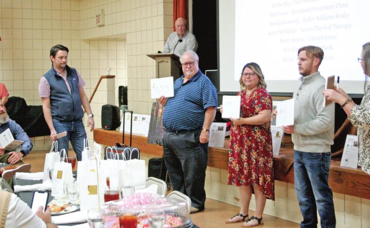 Tecumseh Chamber of Commerce Past Board President Luke Fugate (left) oversees a game of “Price is Right” during the Tecumseh Chamber of Commerce’s 21st Annual Auction. Countywide &amp; Sun/Kendra Johnson