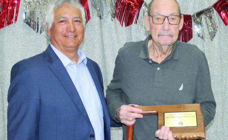 Former, long-time Asher baseball coach Murl Bowen, right, receives the first Asher Baseball Booster Club Hall of Fame plaque from current Head Baseball Coach David Rolette during the First Annual Asher Baseball Spring Kickoff and Hall of Fame Banquet at Asher Public Schools cafeteria on March 8. Nine other alumni were also inducted into the Hall of Fame. Natasha Dunagan, Countywide & Sun